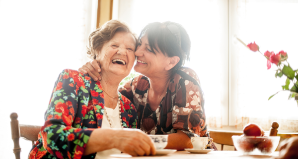 mother and daughter laughing